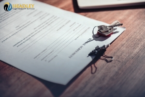 A rental agreement on a desk - Headley Legal Support Florida.