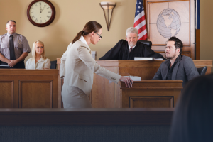 Courtroom scene with an attorney, witness, judge, and jury.- Headley Legal Support Florida